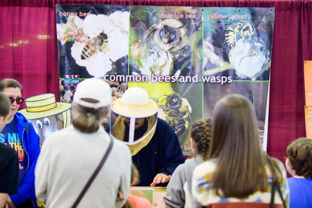 The bee keeper speaks to the audience on Wednesday, March 20, 2024, in the John M. Parker Agricultural Coliseum on Ag Center Lane in Baton Rouge, La.