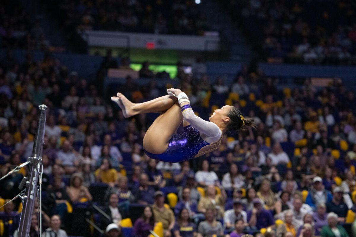 LSU gymnastics junior all-around Aleah Finnegan spins in the air Friday, March 15, 2024, during LSU's 198.250-196.075 win against North Carolina at the Pete Maravich Assembly Center in Baton Rouge, La.