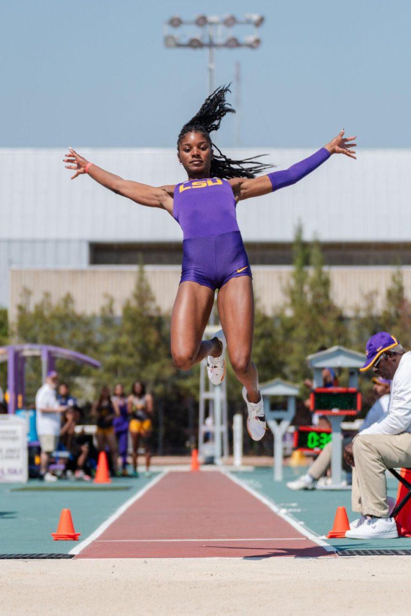 LSU track and field jumps senior Morgan Smalls flies through the air Saturday, March 23, 2024, during the Keyth Talley Invitational at the Bernie Moore Track Stadium in Baton Rouge, La.