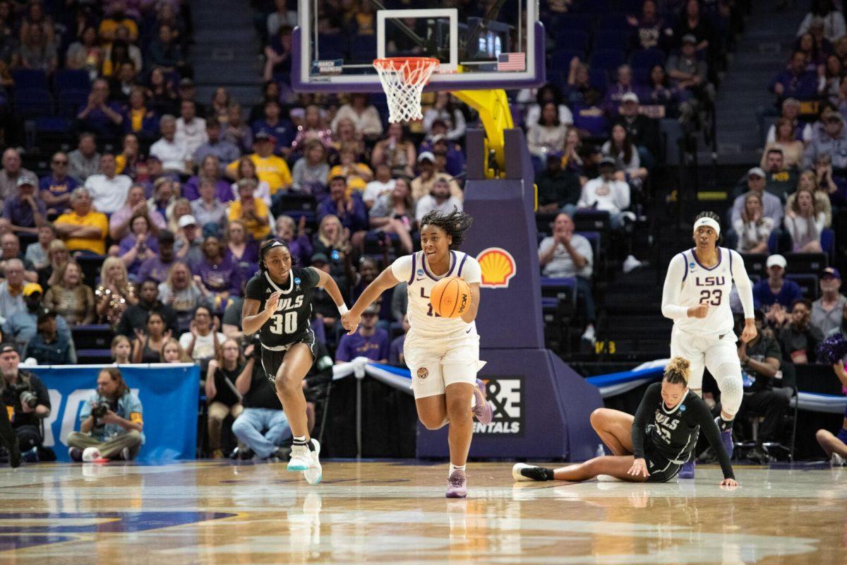 LSU women&#8217;s basketball freshman guard Mikaylah Williams (12) hustles after a rebound Friday, March 22, 2024, during LSU&#8217;s 70-60 first-round NCAA March Madness tournament victory against Rice at the Pete Maravich Center in Baton Rouge, La.