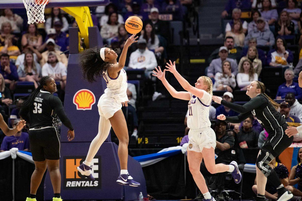 <p>LSU women’s basketball junior forward Angel Reese (10) and graduate student guard Hailey Van Lith (11) go for a rebound Friday, March 22, 2024, during LSU’s 70-60 first-round NCAA March Madness tournament victory against Rice at the Pete Maravich Center in Baton Rouge, La.</p>