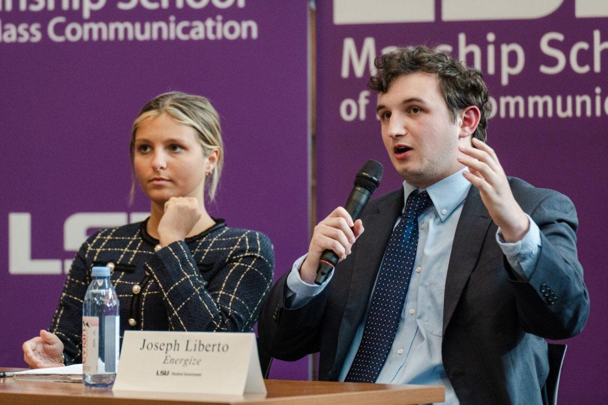 Joseph Liberto answers a question as Amelia Carman listens Monday, March 18, 2024, inside the Holliday Forum at LSU in Baton Rouge, La.