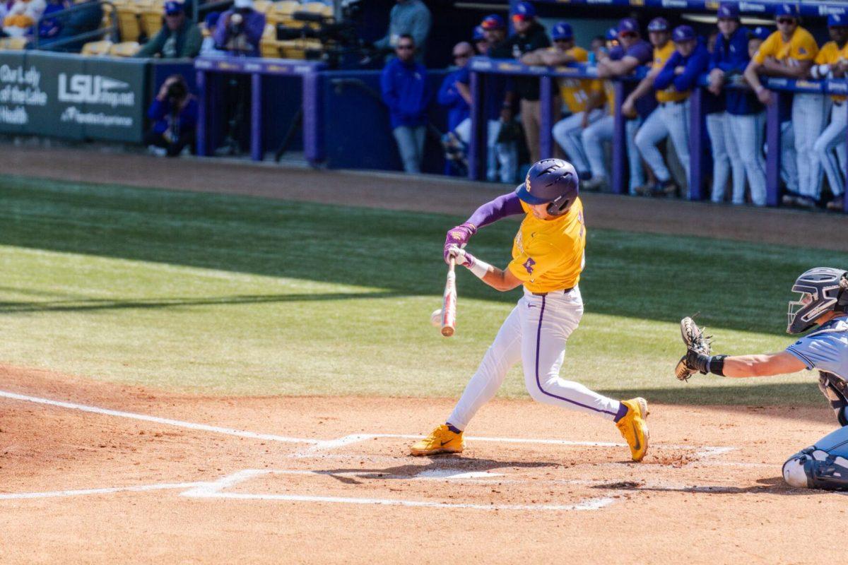 LSU baseball freshman infielder Steven Milam (4) connects with the ball Sunday, March 10, 2024, during LSU's 2-1 loss to Xavier in Alex Box Stadium in Baton Rouge, La.