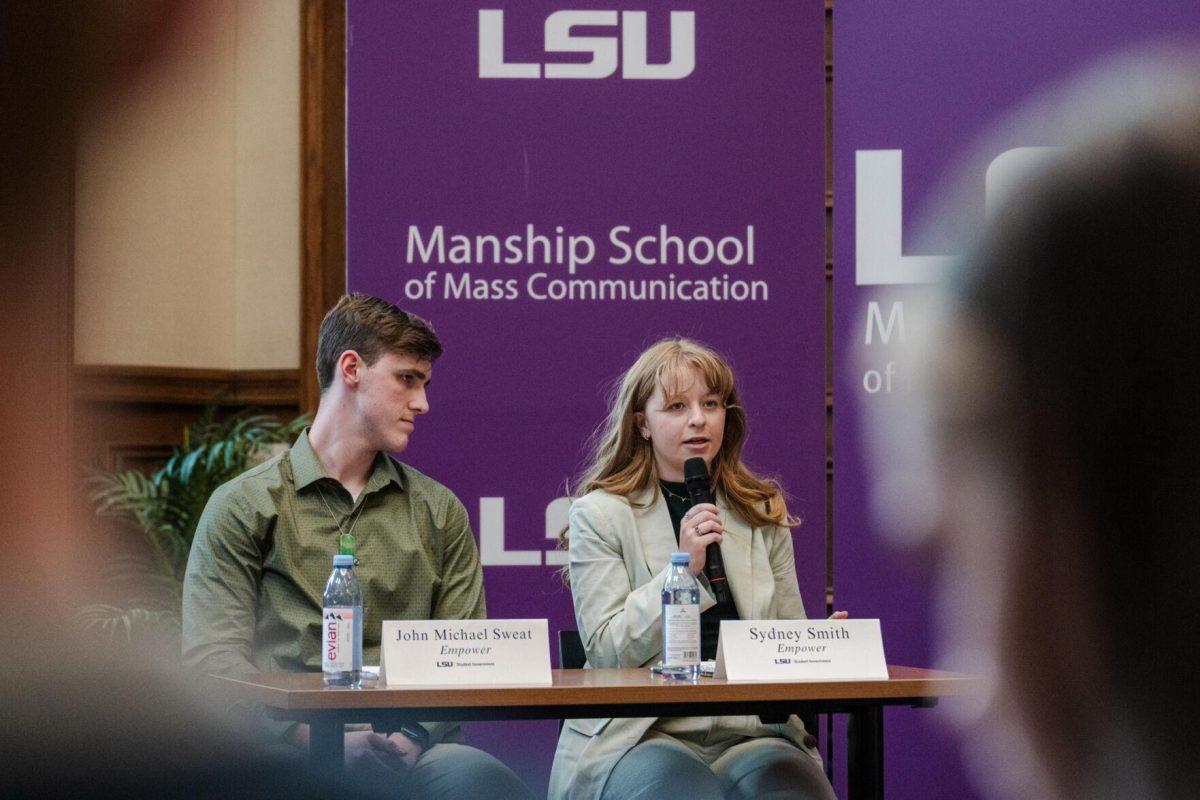 Sydney Smith answers a question as John Michael Sweat listens Monday, March 18, 2024, inside the Holliday Forum at LSU in Baton Rouge, La.