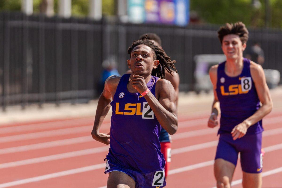 LSU track and field distance junior Dyllon Nimmers pumps his arms while running Saturday, March 23, 2024, during the Keyth Talley Invitational at the Bernie Moore Track Stadium in Baton Rouge, La.