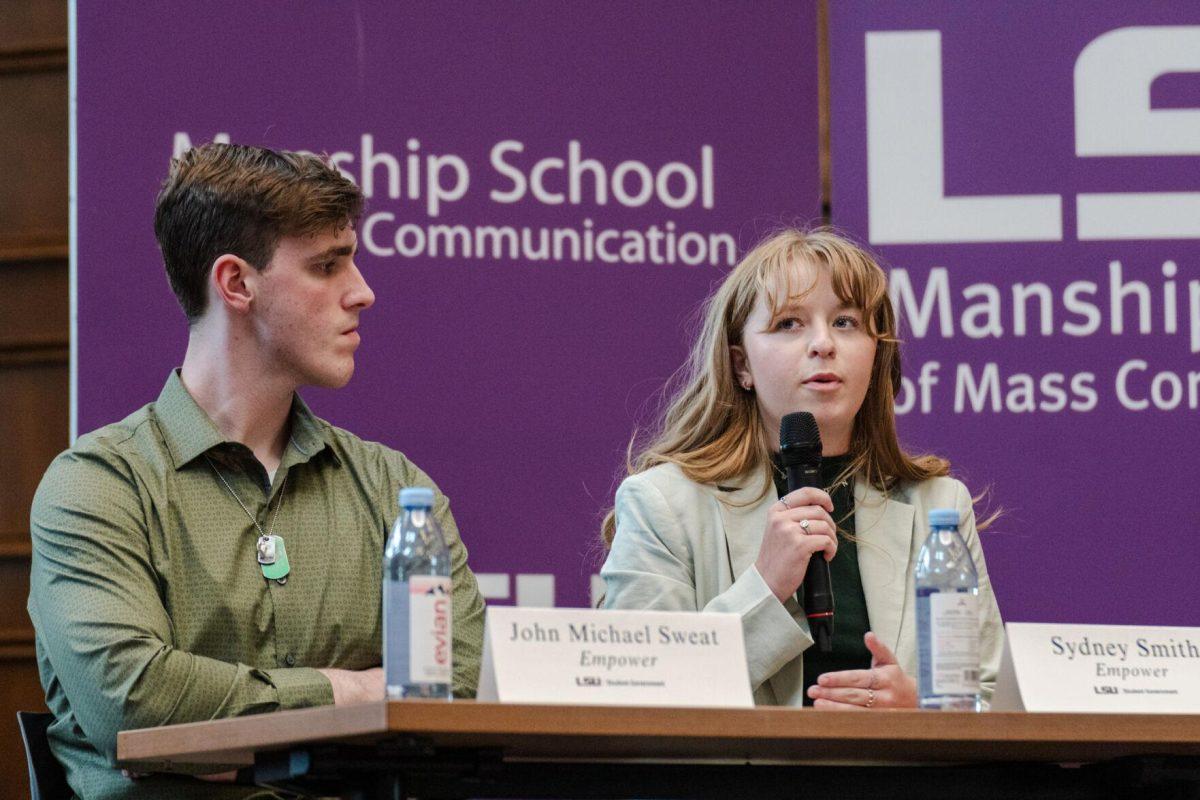 Sydney Smith answers a question as John Michael Sweat listens Monday, March 18, 2024, inside the Holliday Forum at LSU in Baton Rouge, La.