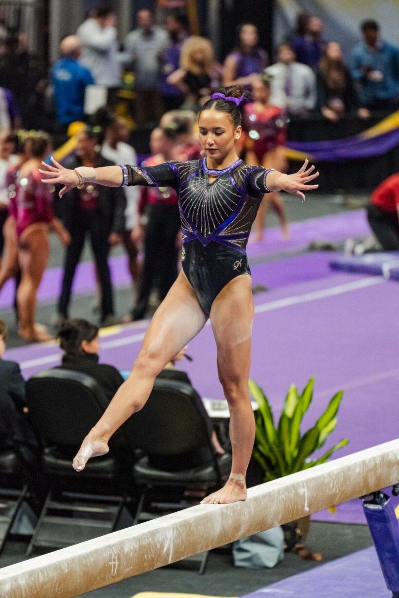 LSU gymnastics all-around junior Aleah Finnegan moves along the balance beam Friday, March 1, 2024, during LSU&#8217;s 198.325-197.325 win against Alabama in the Pete Maravich Assembly Center in Baton Rouge, La.