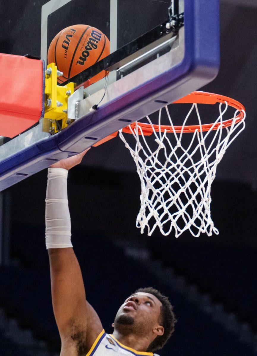 LSU men&#8217;s basketball graduate student guard Jordan Wright (6) scores a basket Tuesday, March 19, 2024, during LSU&#8217;s 84-77 loss to the University of North Texas at the PMAC in Baton Rouge, La.