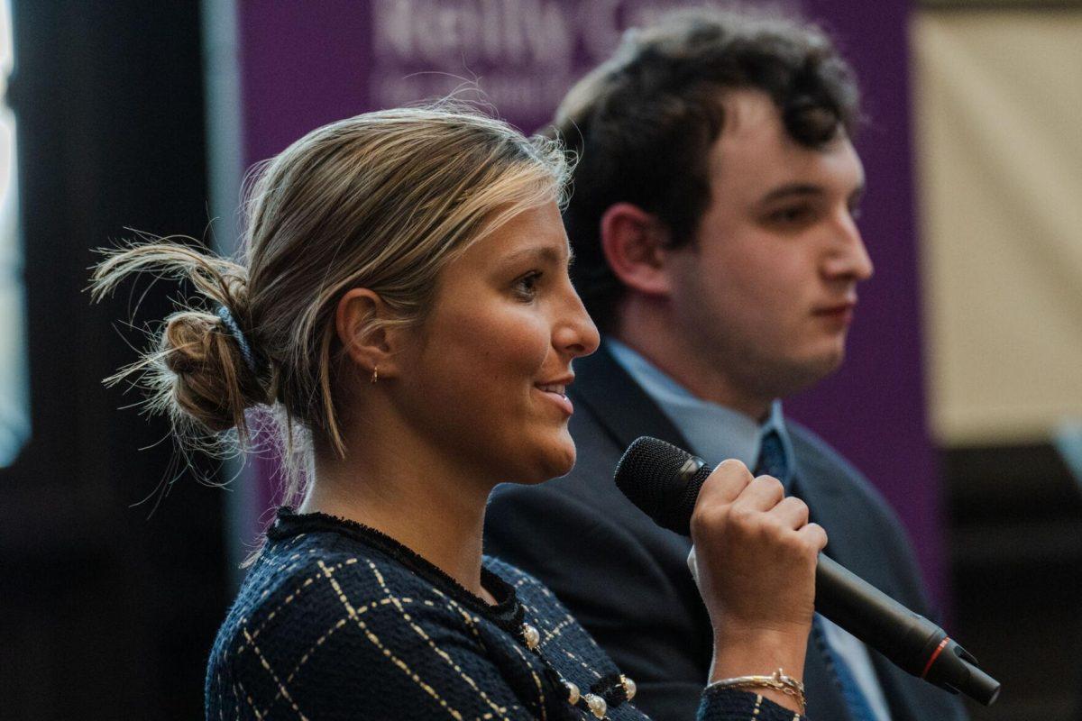 Amelia Carman answers a question as Joseph Liberto listens Monday, March 18, 2024, inside the Holliday Forum at LSU in Baton Rouge, La.