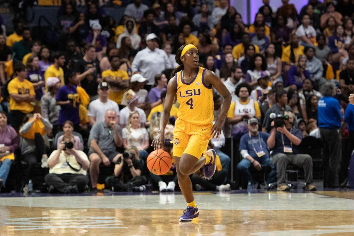 LSU women's basketball sophomore guard Flau'jae Johnson (4) dribbles down the court Sunday, March 3, 2024, during LSU&#8217;s 77-56 win against Kentucky at the Pete Maravich Assembly Center in Baton Rouge, La.