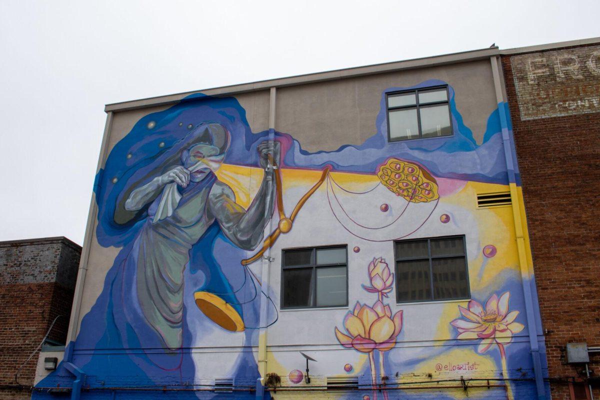 A colorful mural decorates the side of a building on Friday, March 1, 2024, on Laurel St in downtown Baton Rouge, La.