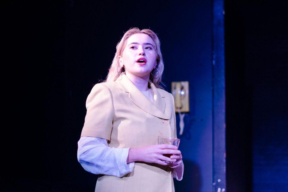 Older Nick Carraway (Sophie Rollins) speaks in a production of Yearning Sunday, March 3, 2024, in Coates Hall on LSU's campus.