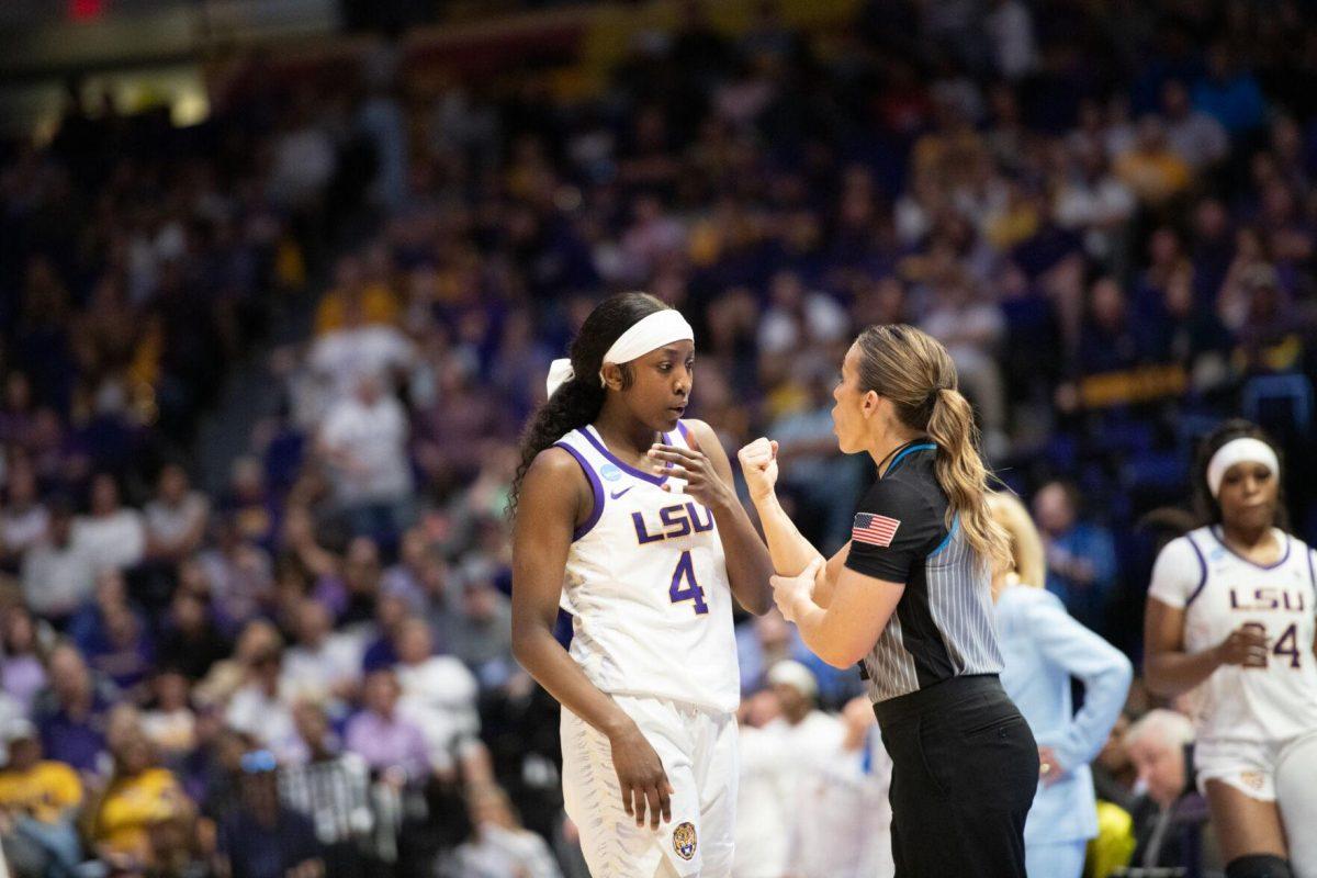 LSU women&#8217;s basketball sophomore guard Flau&#8217;jae Johnson (4) talks with a referee Friday, March 22, 2024, during LSU&#8217;s 70-60 first-round NCAA March Madness tournament victory against Rice at the Pete Maravich Center in Baton Rouge, La.