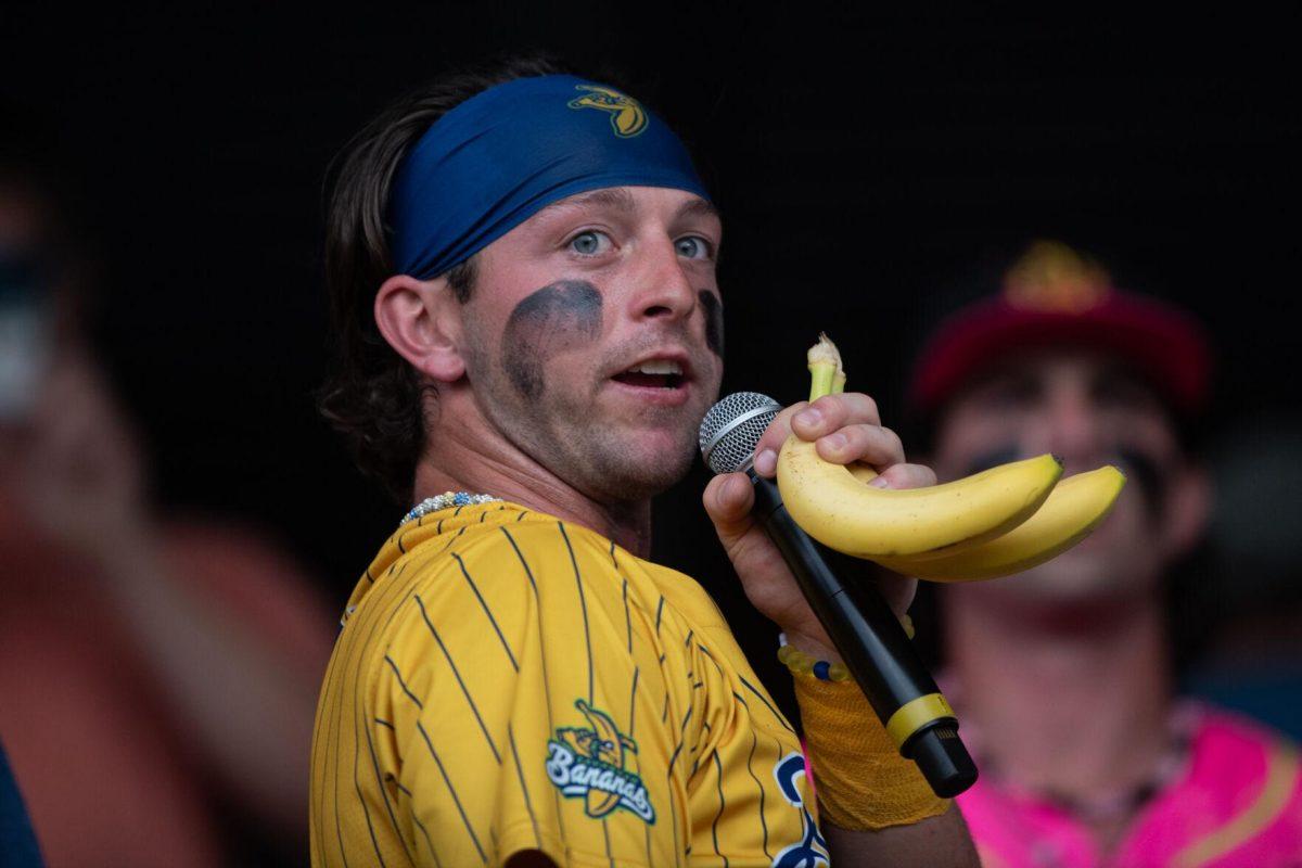 Savannah Bananas catcher Bill Leroy (1) leads pre-game festivities Thursday, March 14, 2024, before the Savannah Bananas 5-4 loss to the Party Animals during their world tour stop at Alex Box Stadium in Baton Rouge, La.