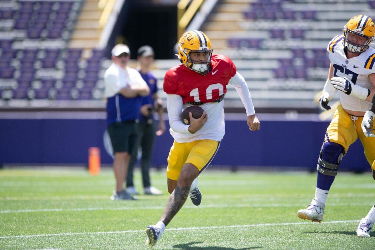 LSU football junior wide receiver Zavion Thomas (10) runs with the ball during the LSU Spring Football game on Saturday, April 13, 2024, in Tiger Stadium.