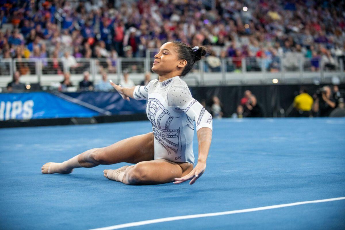 LSU gymnastics all-around Haleigh Bryant stretches her arm out to the side during her routine during the NCAA Gymnastics Championship on Saturday, April 20, 2024, in Fort Worth, Tx.