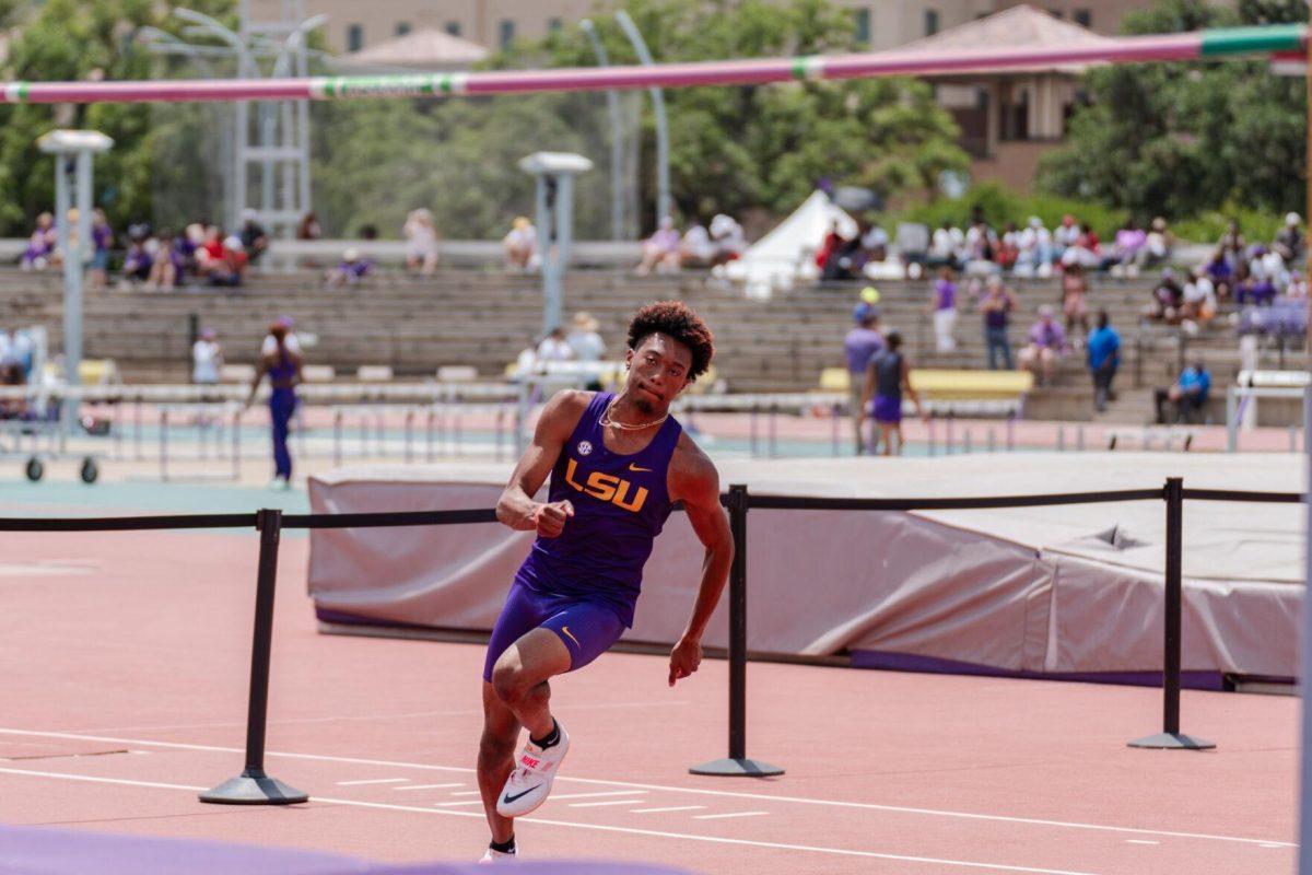 LSU track and field jumps senior Ronnie Rounds II runs toward the bar Saturday, April 27, 2024, at the LSU Invitational in the Bernie Moore Track Stadium in Baton Rouge, La.