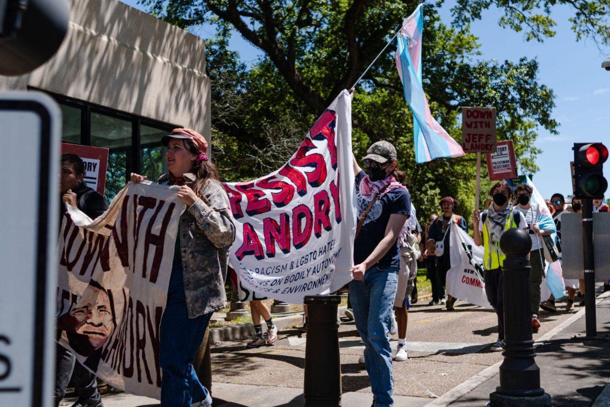 Rally attendees march near the Capitol Monday, April 22, 2024, at a protest in Baton Rouge, La.