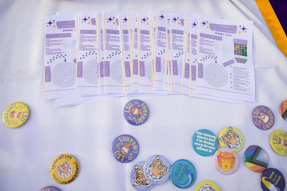 Pins and brochures fill the table