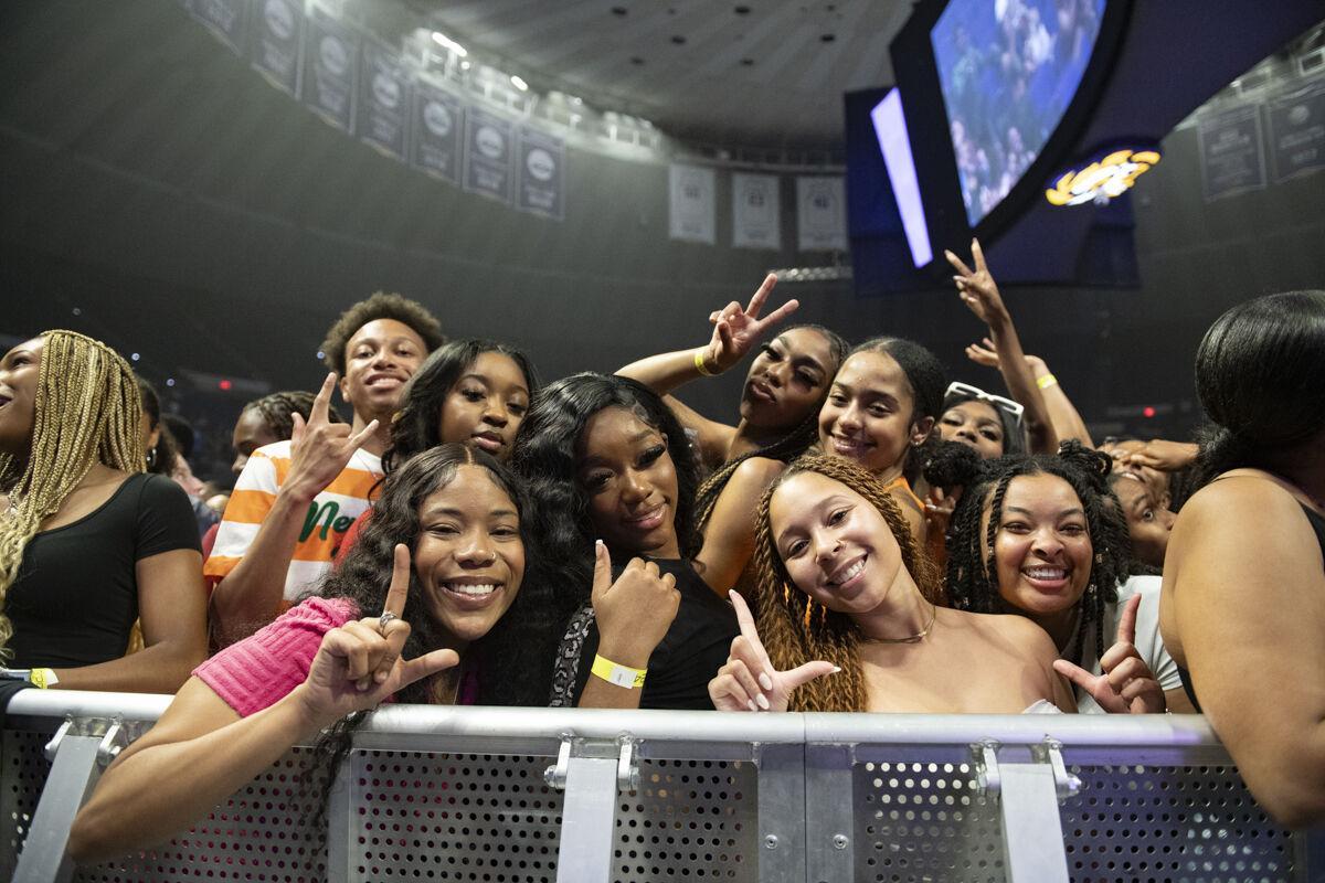 LSU students pose for a photo Thursday, April 25, 2024, during LSU Student Government&#8217;s annual Groovin&#8217; concert at the Pete Maravich Assembly Center in Baton Rouge, La.