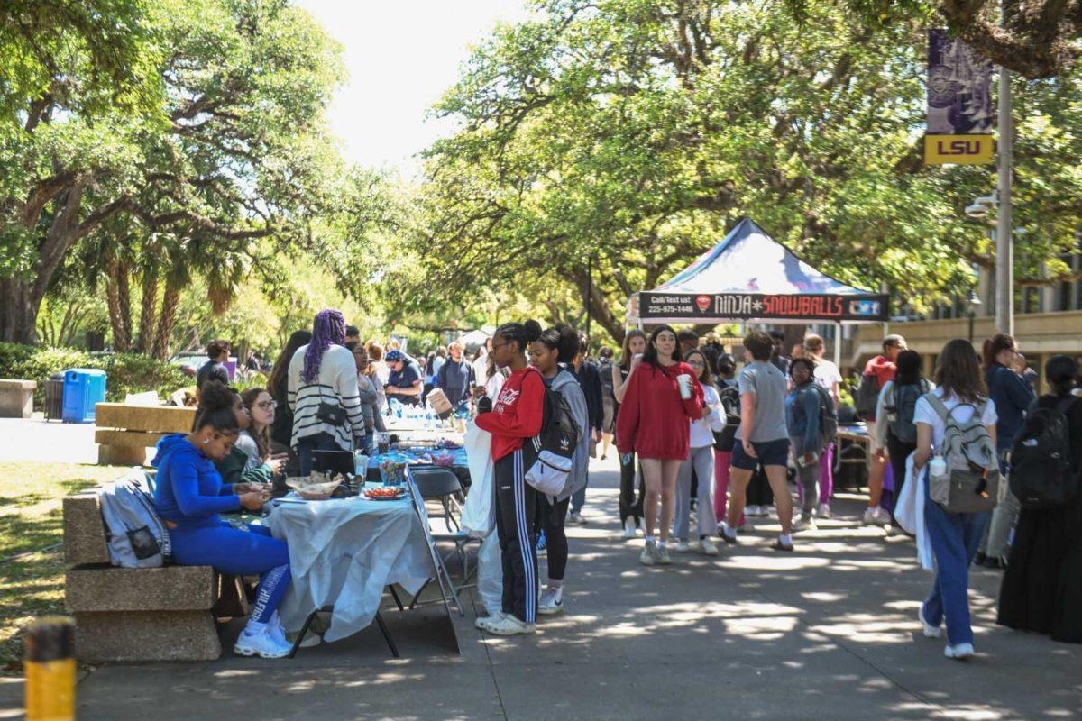 LSU students learn about different organizations during LSU Round the Block in Free Speech Alley on Wednesday, April 3, 2024, on LSU campus in Baton Rouge, La.