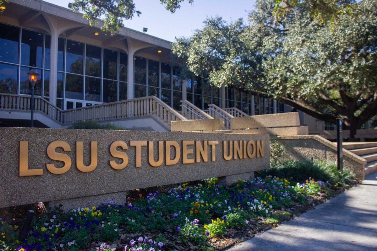 Flowers bloom in front of the sign on Saturday, Jan. 14, 2023, in front of the Student Union in Baton Rouge, La.