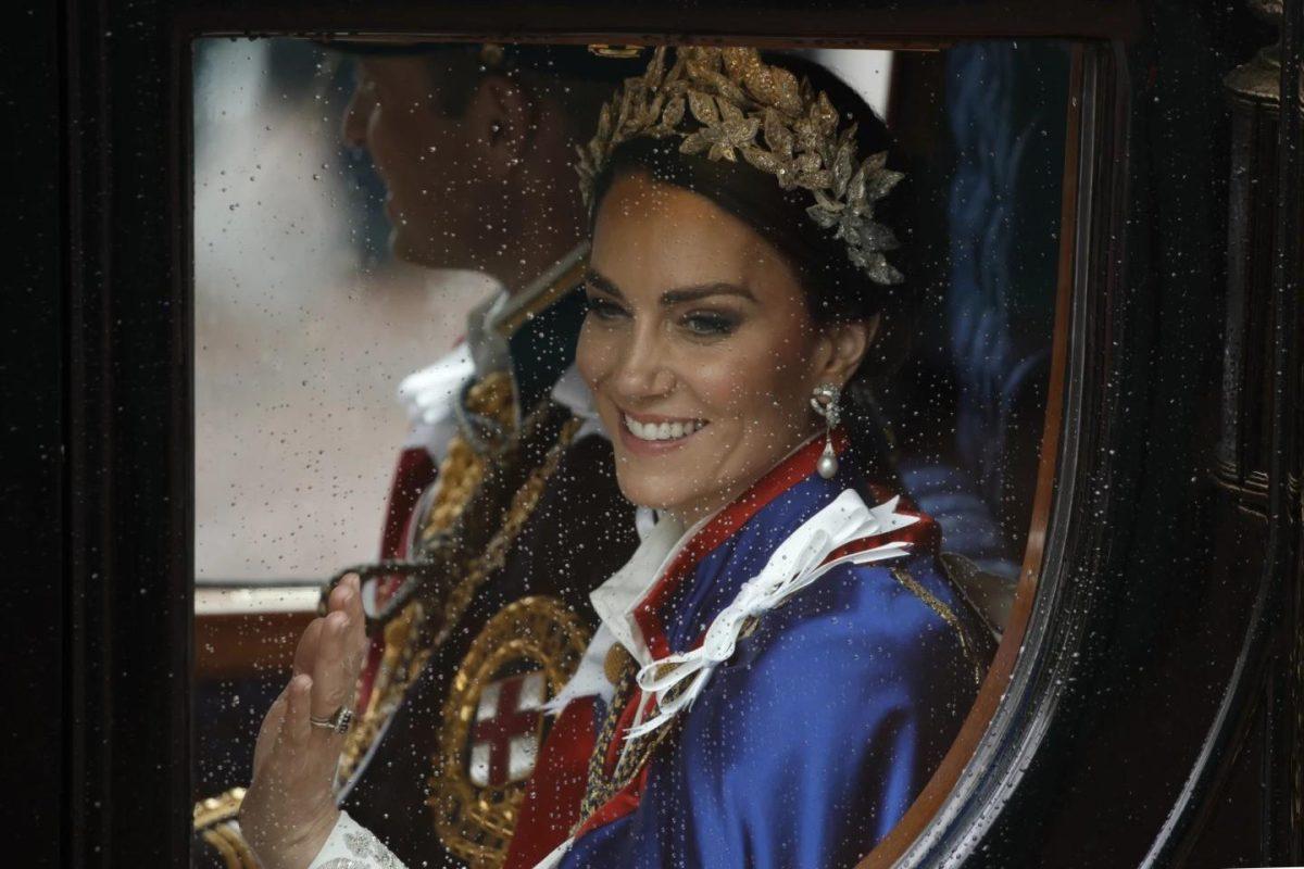 File- Kate, Princess of Wales and Prince William travel in a coach following the coronation ceremony of Britain's King Charles III in London, Saturday, May 6, 2023.