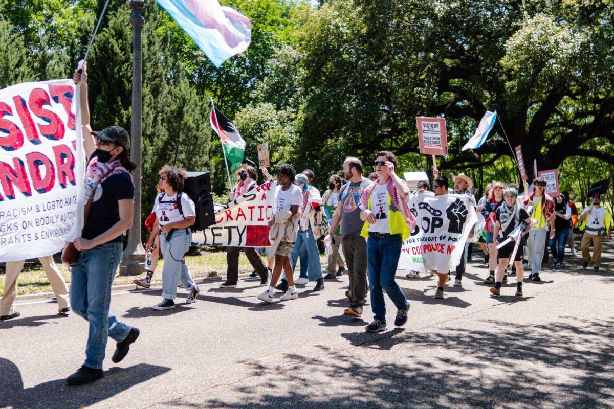 Rally attendees march near the Capitol Monday, April 22, 2024, at a protest in Baton Rouge, La.