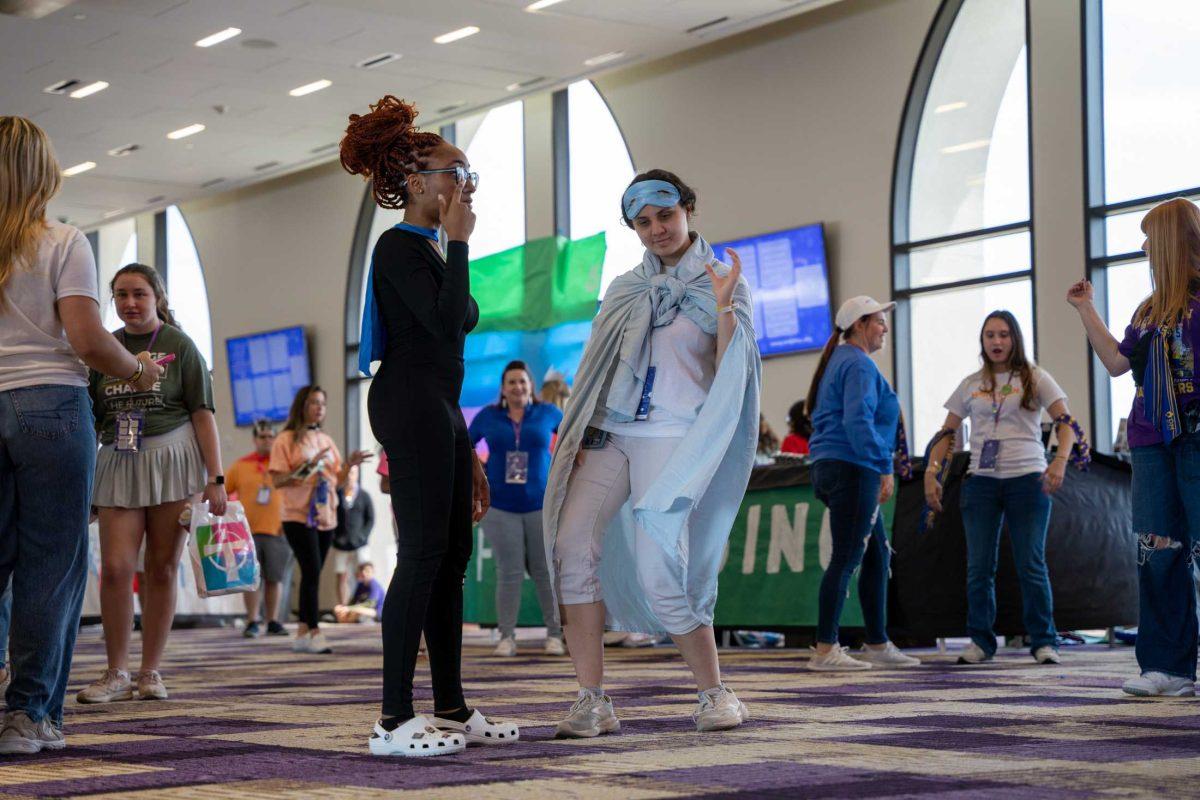 Participants learn a dance Saturday, April 6, 2024 at the LSU Dance Marathon in Tiger Stadium in Baton Rouge, La.