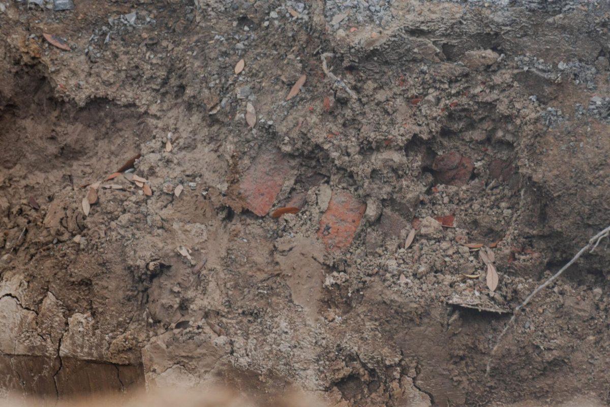 Bricks sit amongst the soil Tuesday, April 2, 2024, under Field House Drive on LSU's campus in Baton Rouge, La.