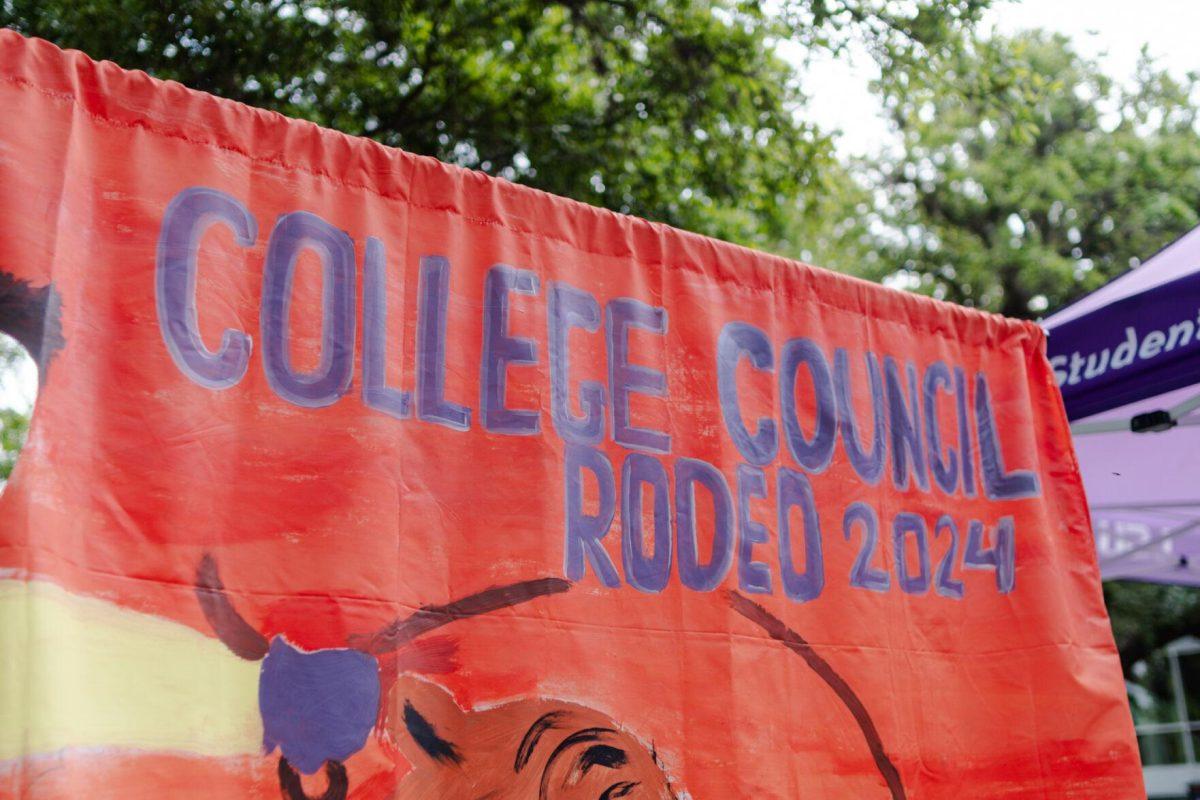 A banner reads "College Council Rodeo 2024" Tuesday, April 2, 2024, on Tower Drive on LSU's campus.