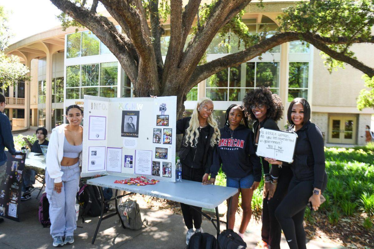 The National Council of Negro Women (NCNW) survey students in Free Speech Alley during LSU Round the Block on Wednesday, April 3, 2024, on LSU campus in Baton Rouge, La.