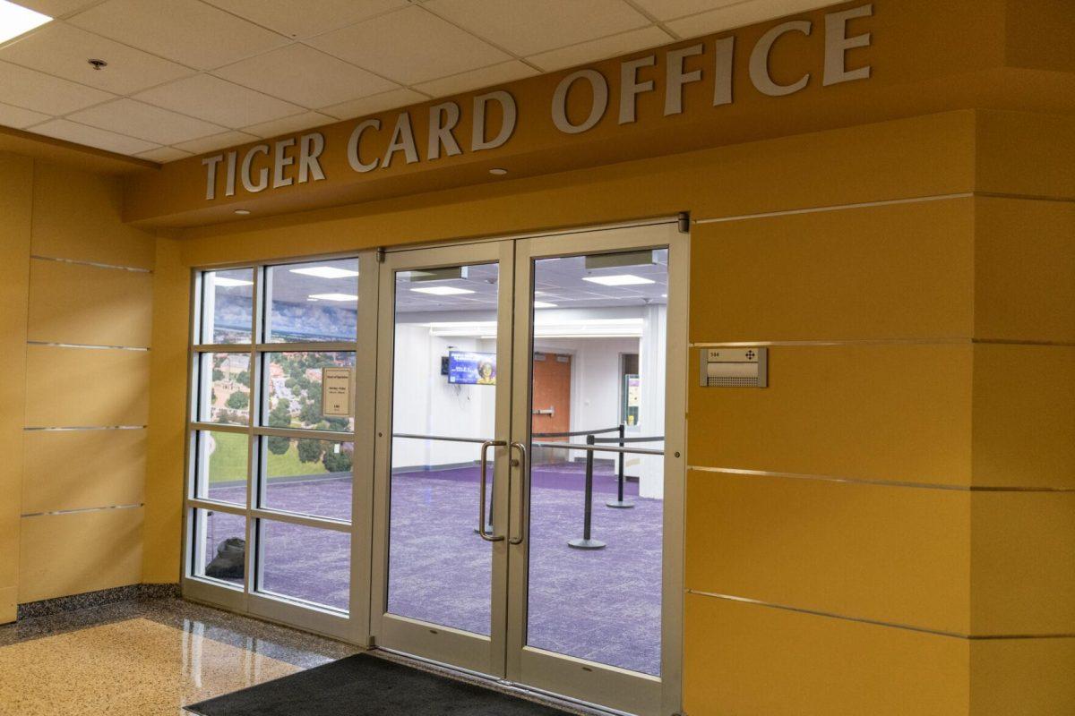 The inside of the Tiger Card Office peaks through the doors Tuesday, April 9, 2024, on the 1st floor of LSU's Student Union in Baton Rouge, La.