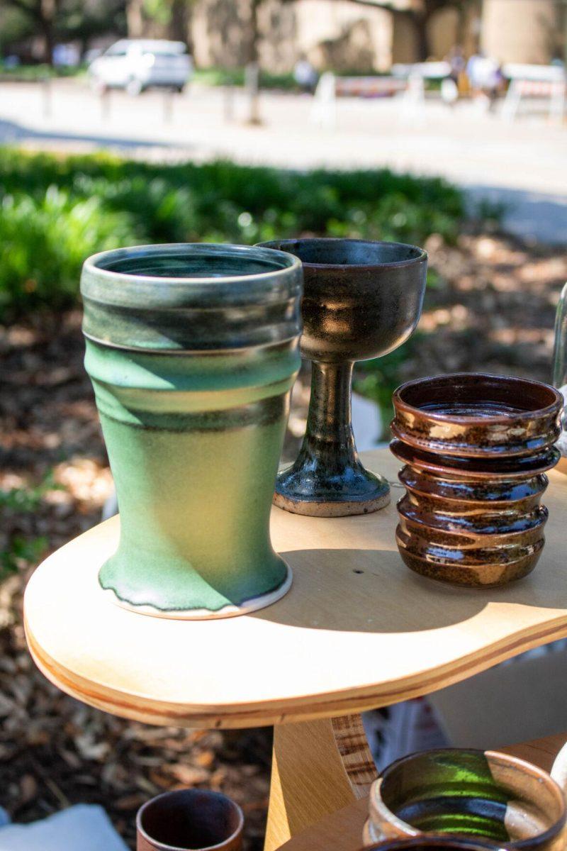 Pottery sits on the shelf on Wednesday, April 24, 2024, in Free Speech Alley on LSU's campus.