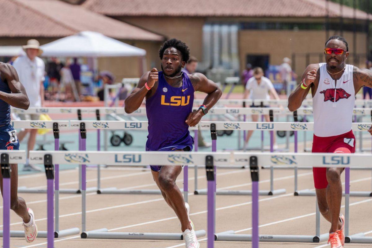 LSU track and field sprints sophomore Jahiem Stern approaches the next hurdle Saturday, April 27, 2024, at the LSU Invitational in the Bernie Moore Track Stadium in Baton Rouge, La.