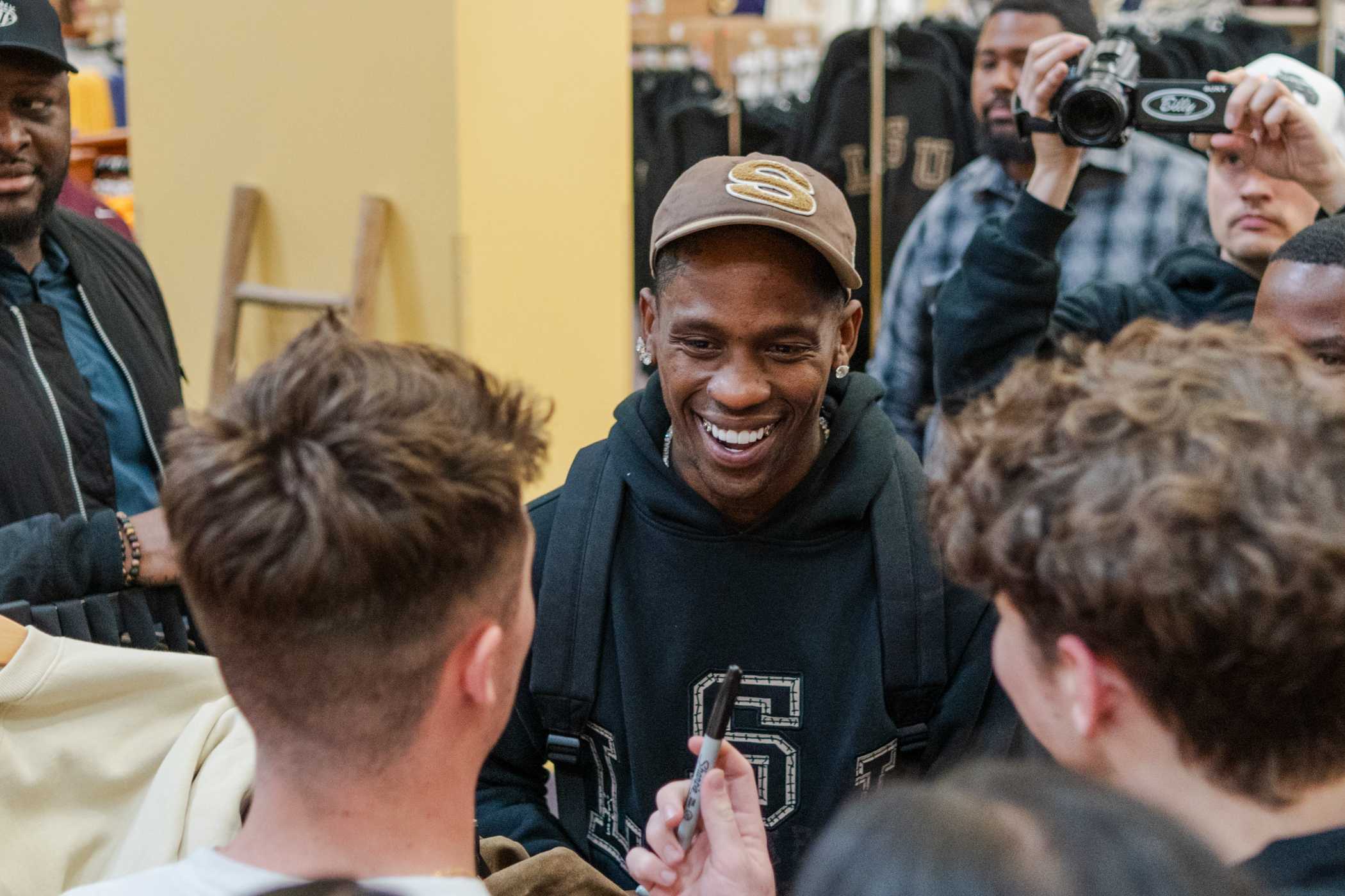 Travis Scott makes surprise appearance on campus to promote apparel campaign