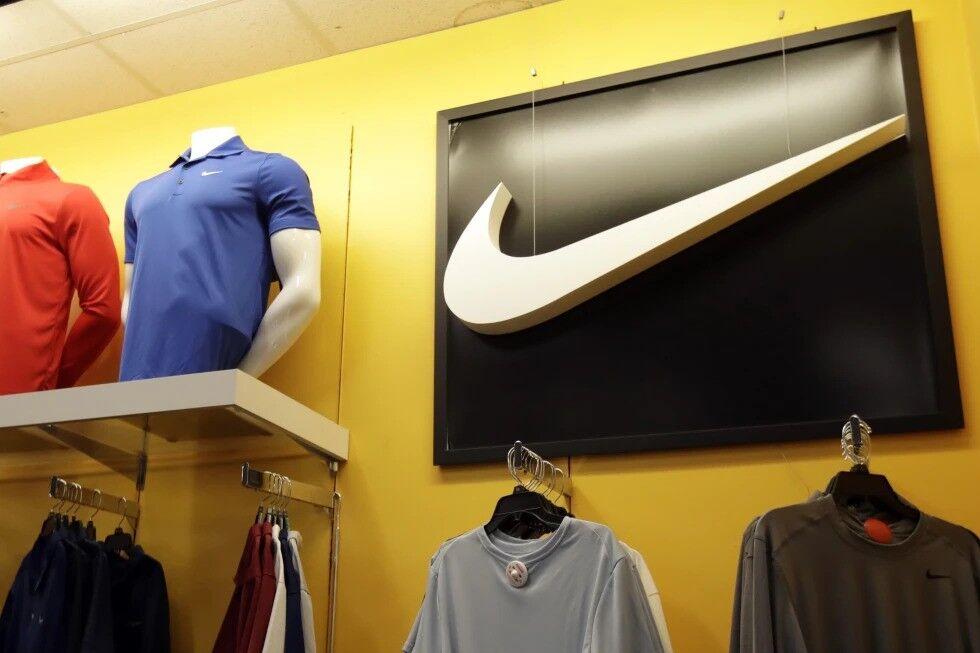 In this Nov. 29, 2019, file photo Nike clothes are displayed at a store in Colma, Calif.