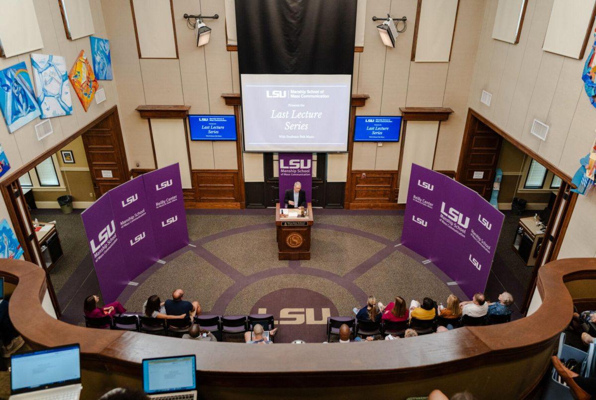 Professor Bob Mann speaks to the crowd Wednesday, April 17, 2024, at the Last Lecture Series in the Holliday Forum at LSU in Baton Rouge, La.