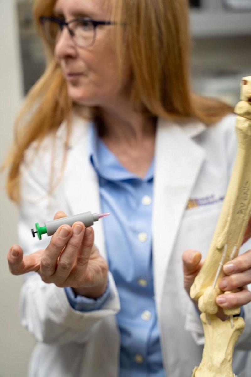 LSU veterinary doctor Mandi Lopez explains her new patented syringe Wednesday, April 17, 2024, at the LSU School of Veterinary Medicine on Skip Bertman Drive in Baton Rouge, La.