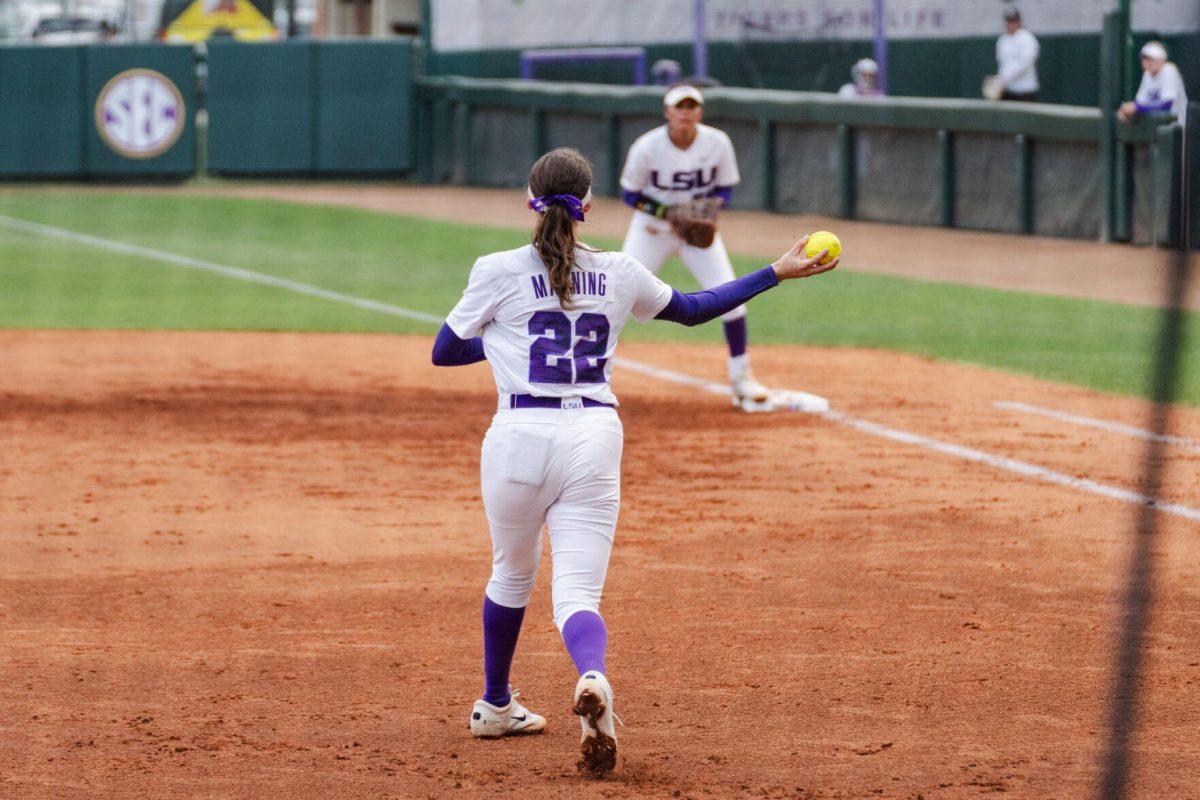 LSU softball freshman infielder Madyson Manning (22) throws the ball to first Friday, April 26, 2024, during LSU's 2-1 loss against Arkansas at Tiger Park in Baton Rouge, La.