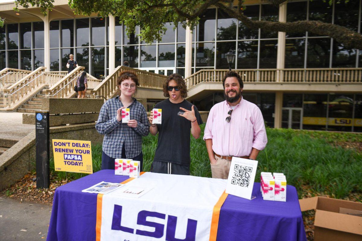 The Collegiate Recovery Program and ROAR-UP LSU hand out free Narcan in Free Speech Alley on Thursday, April 18, 2024, on LSU campus in Baton Rouge, La.