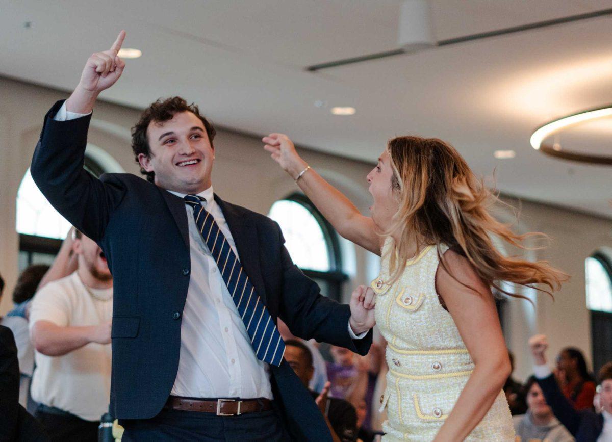 The Energize campaign consisting of Joseph Liberto and Amelia Carman celebrates its election win Monday, April 8, 2024, inside the Huey P. Long Field House on LSU's campus in Baton Rouge, La.