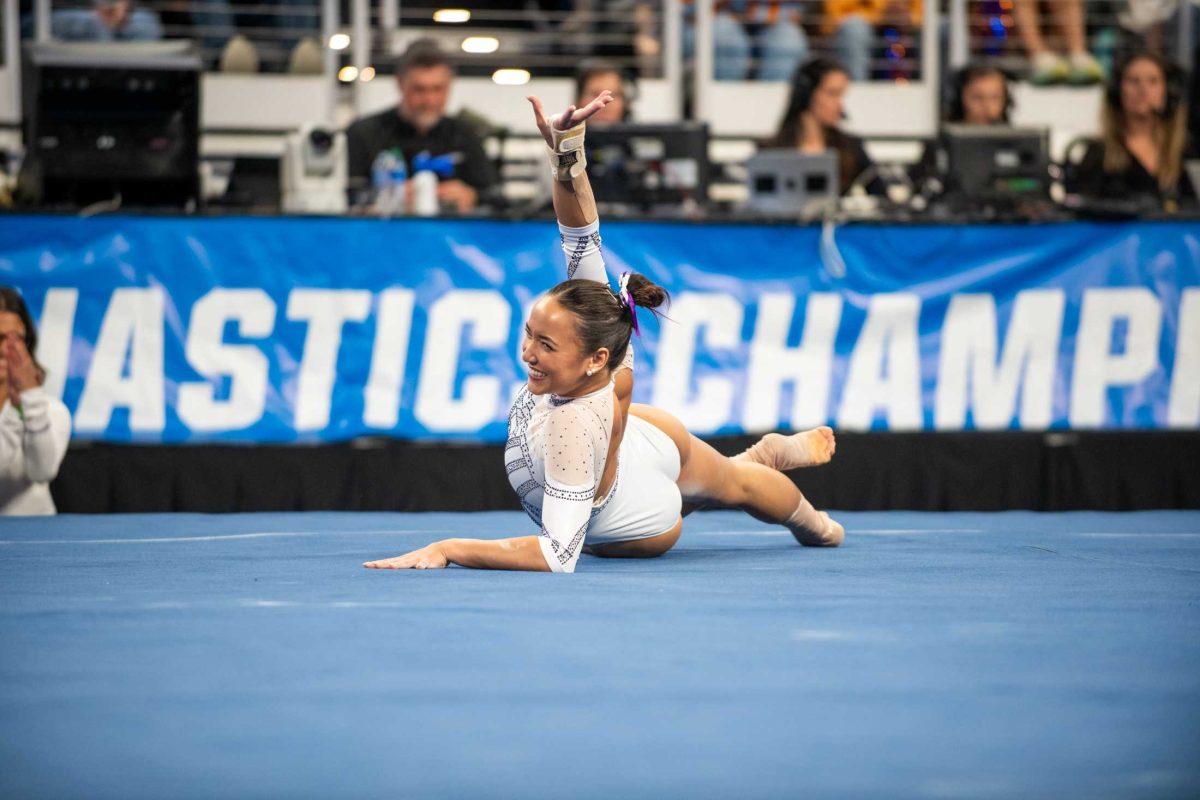 LSU gymnastics all-around Aleah Finnegan looks back and smiles in her ending pose of her routine during the NCAA Gymnastics Championship on Saturday, April 20, 2024, in Fort Worth, Tx.