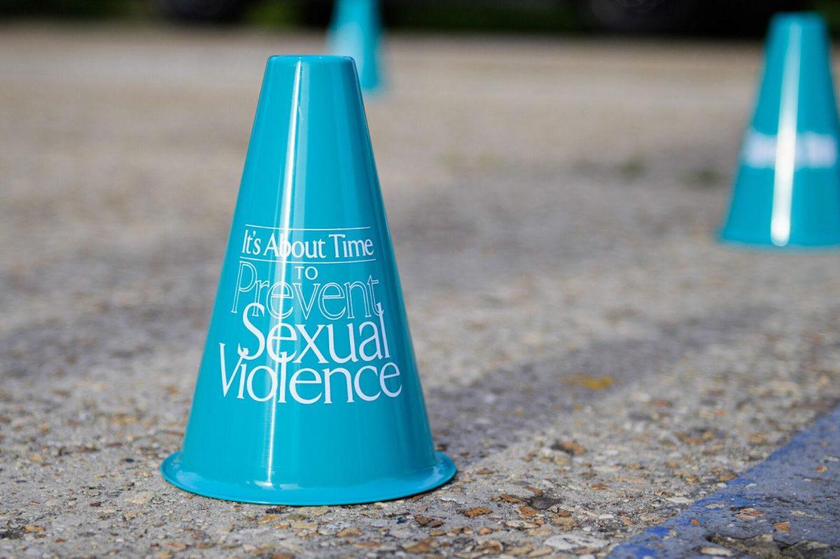 Teal traffic cones sit on Tuesday, April 16, 2024, in front of Memorial Tower in Baton Rouge, La.