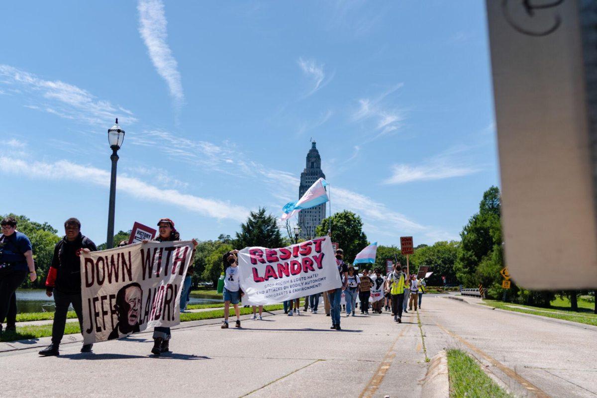 Rally attendees march near the Capitol Monday, April 22, 2024, at a protest in Baton Rouge, La.
