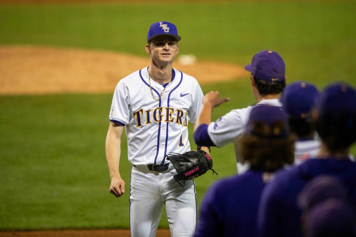 LSU baseball sophomore right-handed pitcher Gavin Guidry (1) walks into the duggout after striking Florida players out during LSU's 6-4 loss against Florida on Saturday, March 23, 2024, at Alex Box Stadium in Baton Rouge, La.