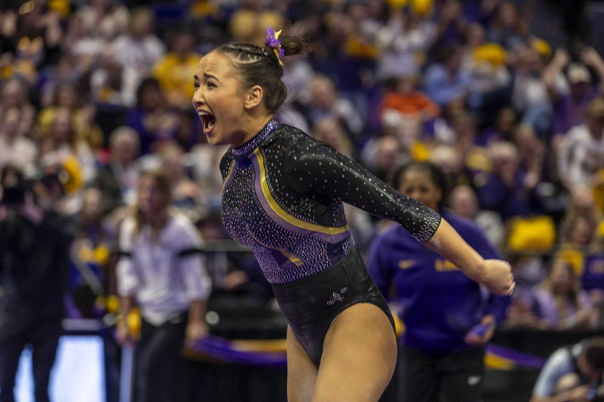 LSU gymnastics junior all-around Aleah Finnegan let's out a roar Friday, Feb. 16, 2024, during LSU's win 198.300-197.10 against Auburn in the Pete Maravich Assembly Center.