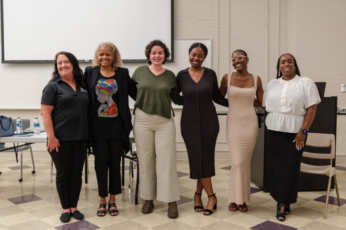 (left to right)&#160;Executive Director of the Iris Domestic Violence Center Patti Joy Freeman, Director of the Lighthouse Program Kreslyn Kelley-Ellis,&#160;Annie Sheehan-Dean,&#160;Sy'rai Adams,&#160;Claudia Bell and&#160;Deputy Title IX Coordinator for Prevention Education/Training Miranda Brown pose for a picture Wednesday, April 17, 2024, after the Black Femicide Panel inside Coates Hall on LSU's campus.