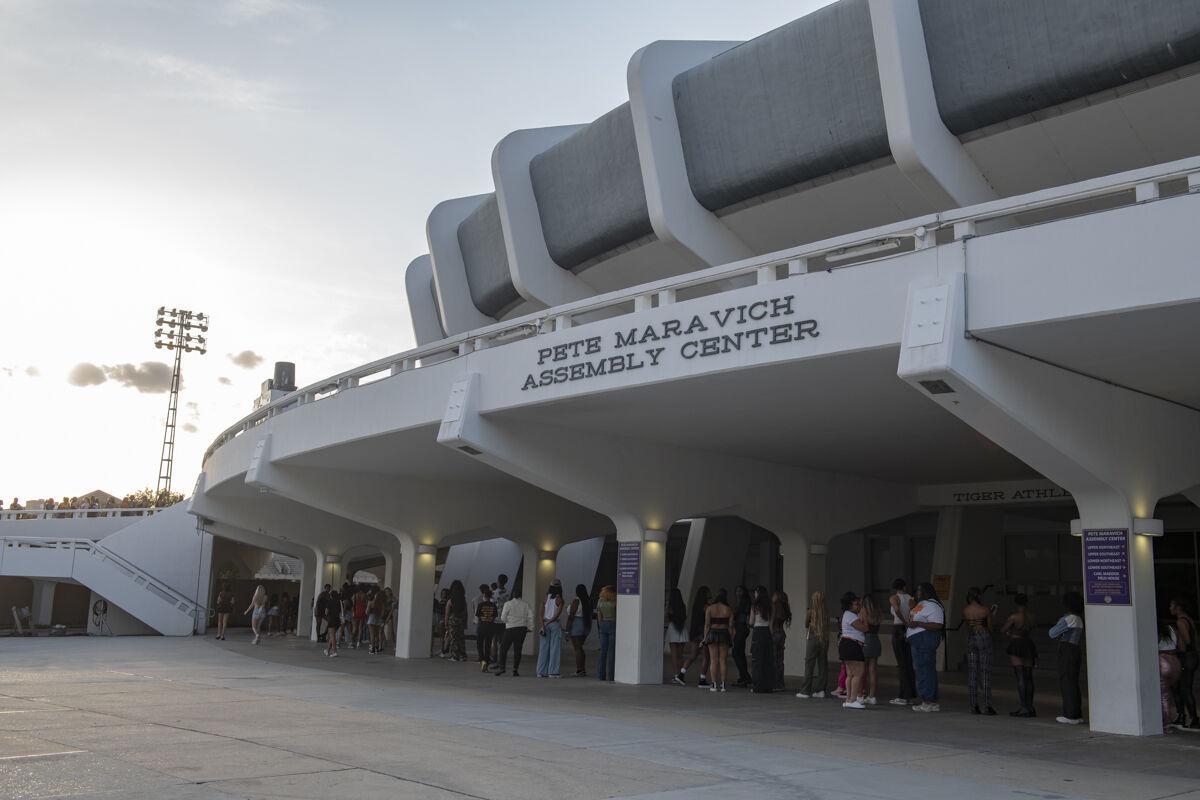 LSU students line up outside the Pete Maravich Assembly Center Thursday, April 25, 2024, before LSU Student Government&#8217;s annual Groovin&#8217; concert in Baton Rouge, La.