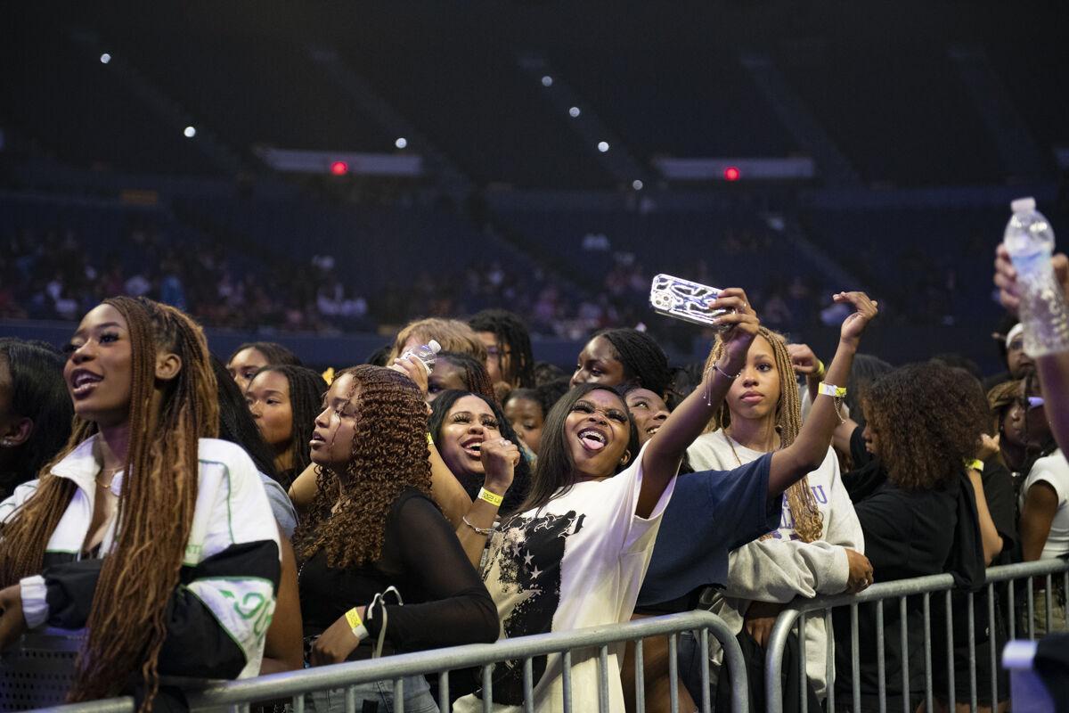 LSU students take a selfie Thursday, April 25, 2024, during LSU Student Government&#8217;s annual Groovin&#8217; concert at the Pete Maravich Assembly Center in Baton Rouge, La.